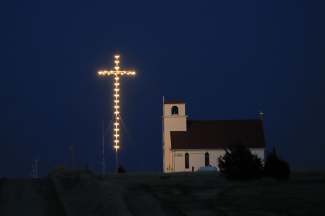 Kansas' high court rules for governor on religious services