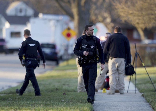 4 people killed and 7 wounded in stabbings in northern Illinois, with a suspect in custody