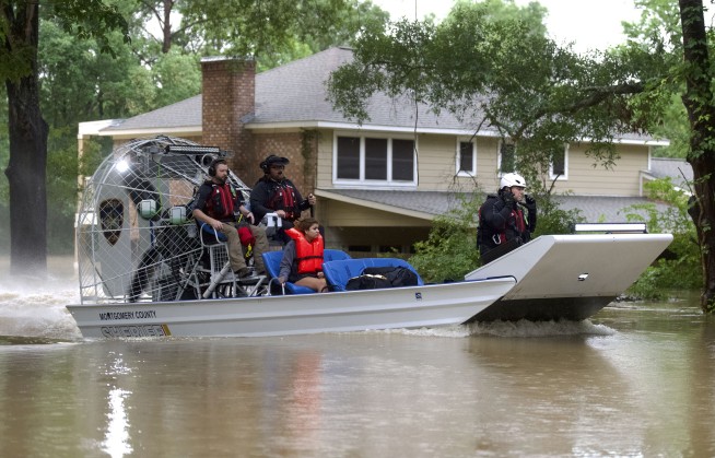 Heavy rains over Texas have led to water rescues, school cancellations and evacuation orders