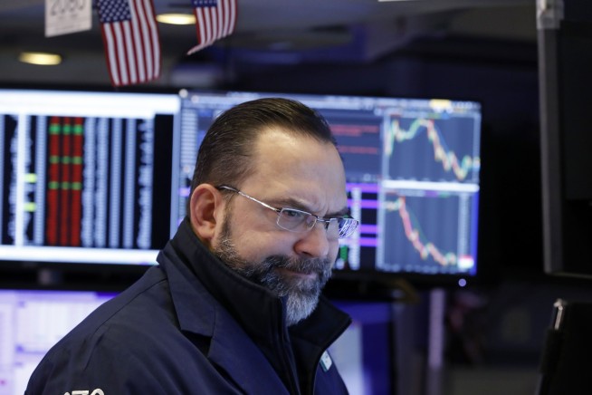 Stocks tumble as virus fears spark sell-off; Dow falls 453