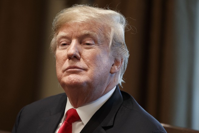 The Latest: Germany says Trump wrong on climate change costs