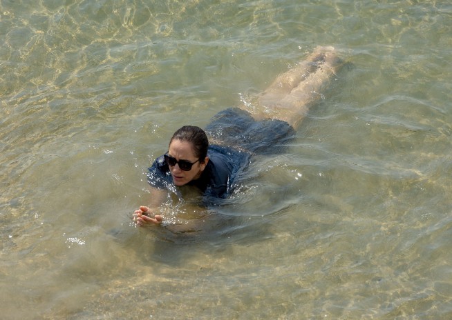 California avoids power outages but fires threaten homes