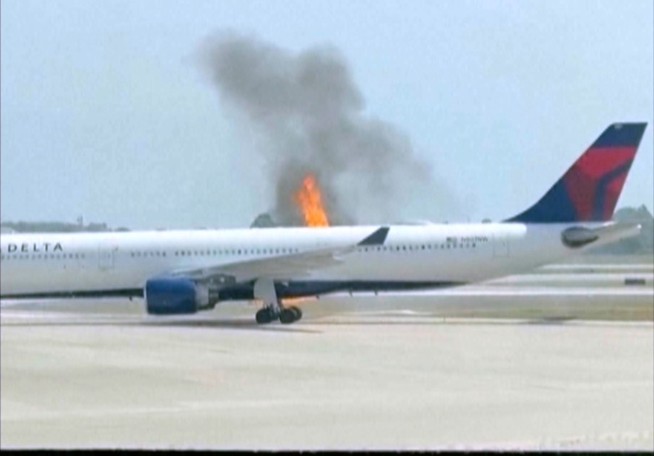Delta plane catches fire at Orlando airport, forcing passenger evacuations