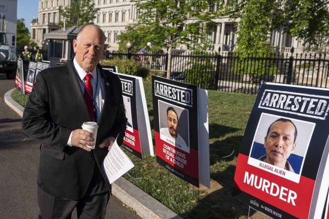 The Latest: Trump signs new executive actions on immigration