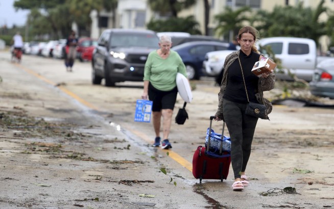 People trapped, 2M without power after Ian swamps SW Florida