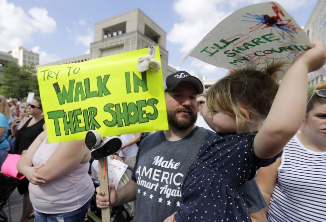 The Latest: Police report assaults at protest in Oregon