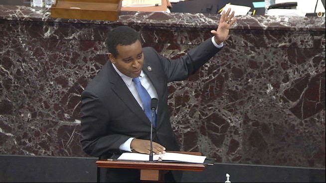 The Latest: Videos of Capitol riot disturb Murkowski, Romney