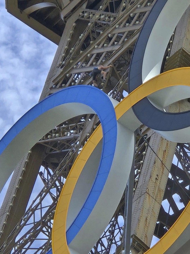 French authorities investigate British man who climbed the Eiffel Tower before Olympics closing show