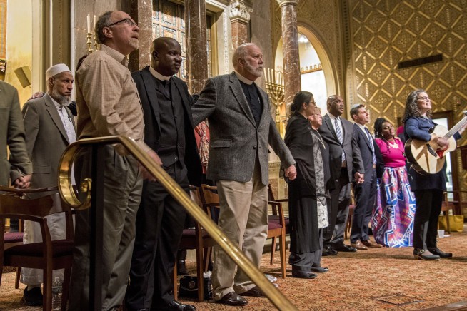 The Latest: Rabbi carried phone because of security training