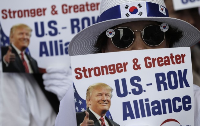 The Latest: Trump arrives in South Korea, plans DMZ visit