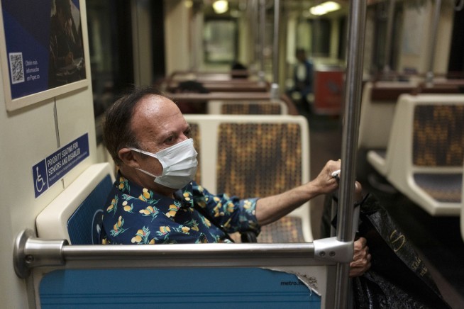 With COVID surging, Los Angeles may soon require masks