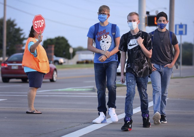 The Latest: First case-free day for New Zealand in 5 weeks