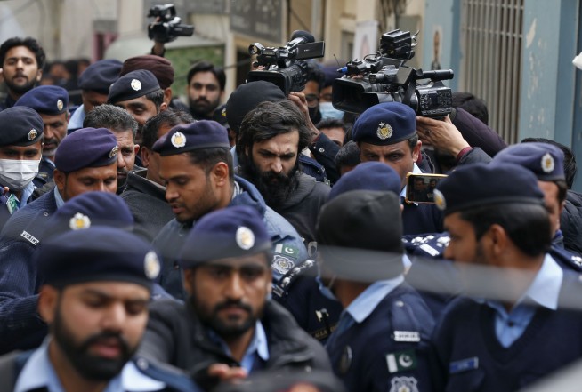 Pakistan court sentences man to death over woman's beheading