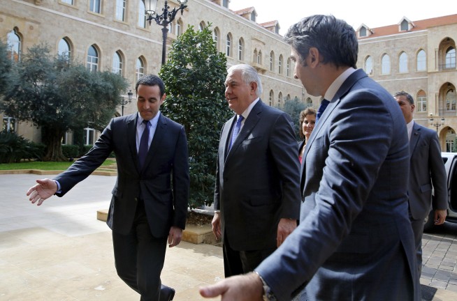 The Latest: Tillerson: Kurds never go heavy weapons from US