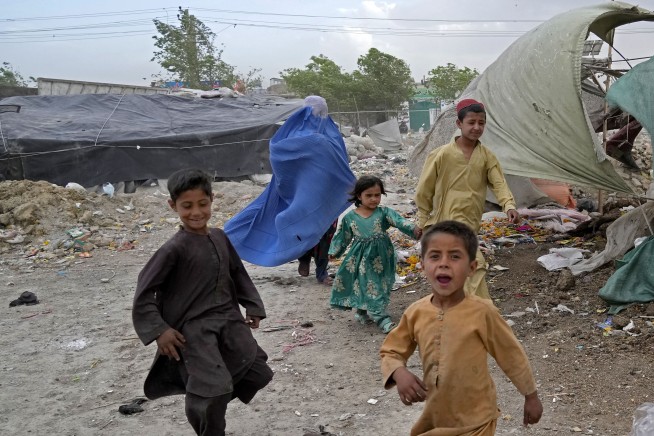 Anger among Afghan women as face veil edict splits Taliban