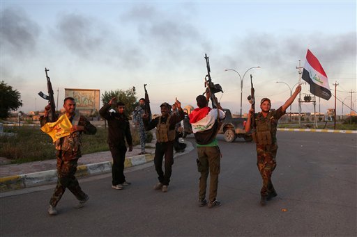 Iraqi teams start exhuming mass grave of soldiers in Tikrit