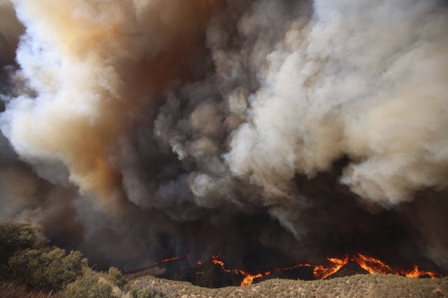 Over 50,000 under evacuation orders or warnings as wildfire imperils homes north of Los Angeles