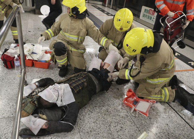 Hong Kong police arrest man after 18 injured in subway fire
