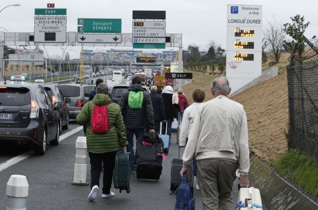 French police: man tried to seize weapon at airport, killed