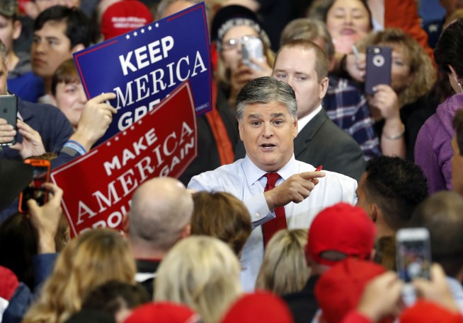 Hannity joins Trump on stage despite claiming he wouldn't