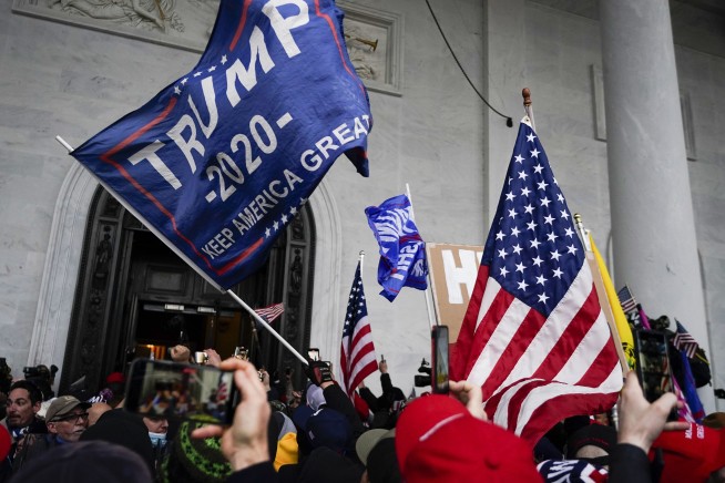 Liberal groups seek to use the Constitution's insurrection clause to block Trump from 2024 ballots