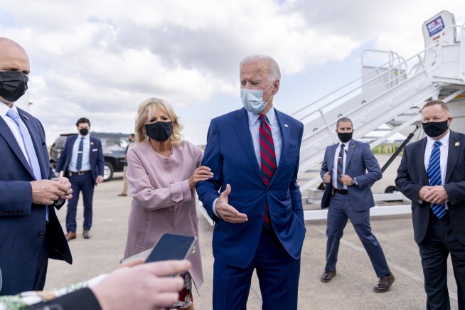 The Latest: Harris-Pence debate will have plexiglass shield