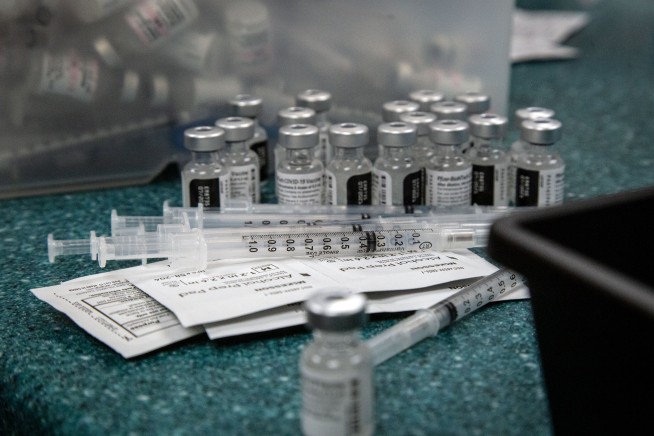 US advisers endorse Pfizer COVID shot for kids 12 and up