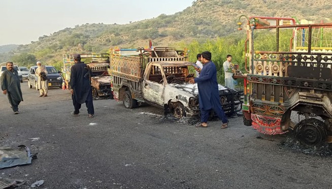 Gunmen kill dozens in multiple attacks in one of the deadliest days in a Pakistani province