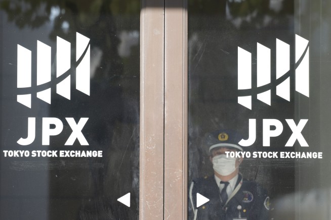 Stock market today: Asian shares are mostly lower, with markets in Japan and US closed