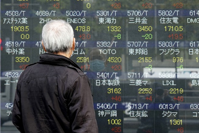 Asia stocks mixed after Wall St dips on US recession warning