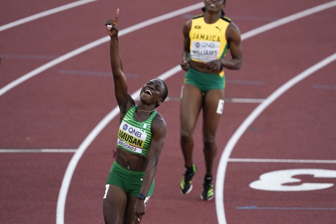 Nigerian Amusan gets world record on wild night in hurdles