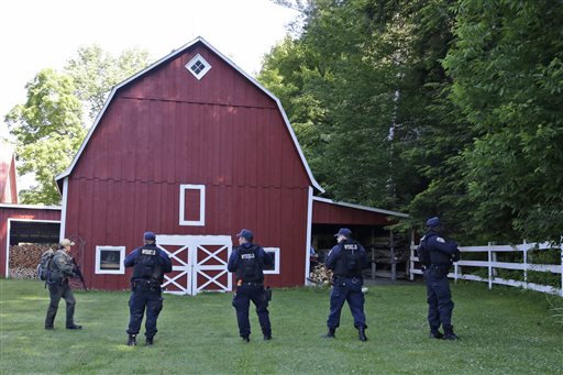 Searchers edge north on Day 21 of hunt for prison escapees