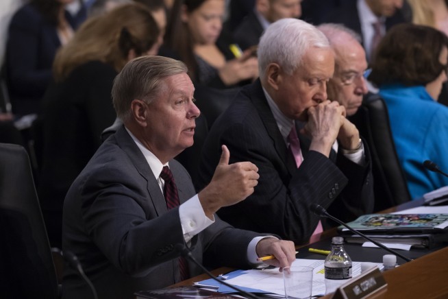 Treading carefully, Kavanaugh dodges confirmation minefields