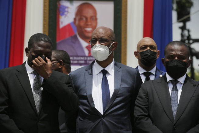 Haiti prosecutor asks judge to charge, probe PM in slaying
