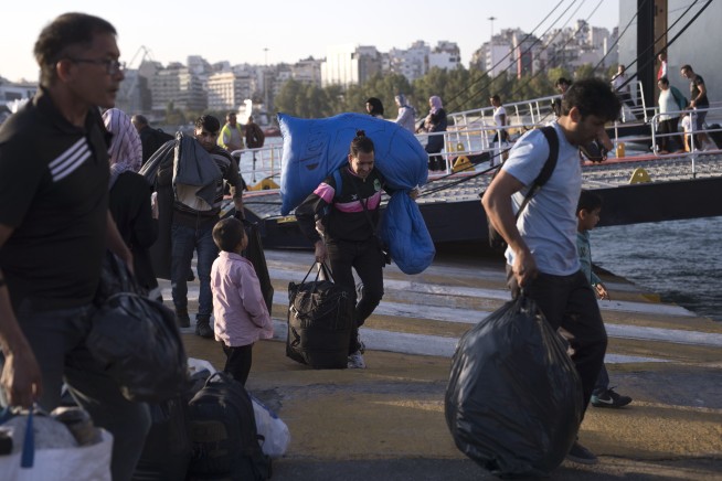 The Latest: Croatia detains 2 migrants for hijacking bus