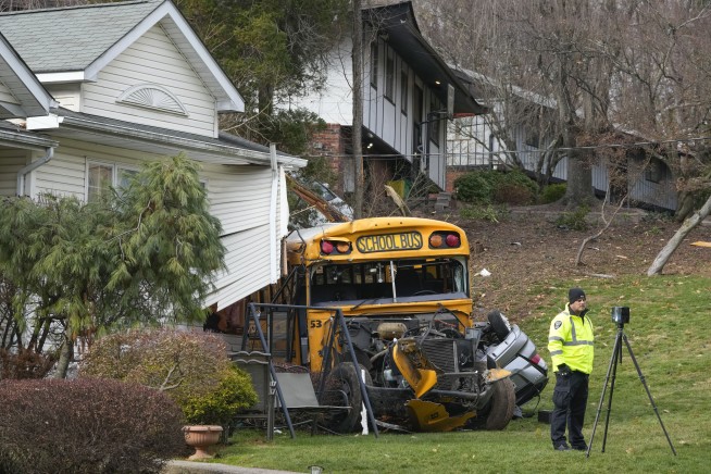 7 kids hurt when school bus crashes into house in NY suburb