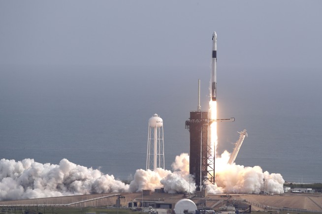 SpaceX launches, destroys rocket in astronaut escape test