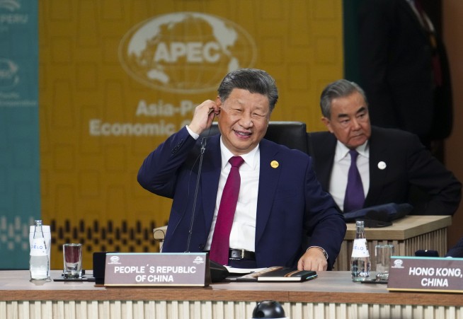 In a meeting with Biden, China's Xi cautions US to 'make the wise choice' to keep relations stable