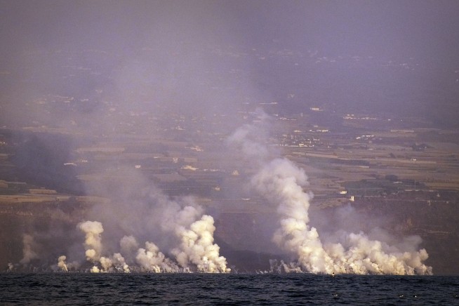 Erupting Spanish volcano turns 'more aggressive': officials