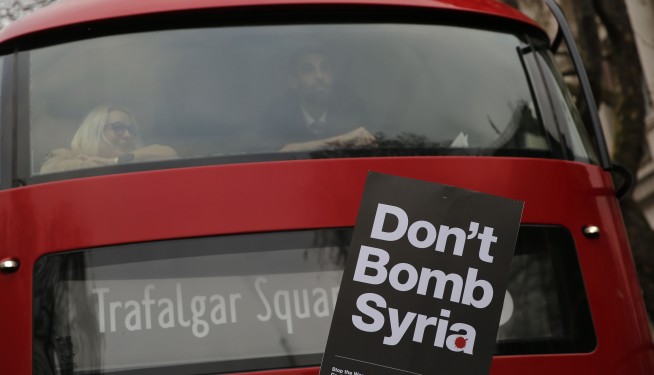 The Latest: Macron says 'red line has been crossed' in Syria