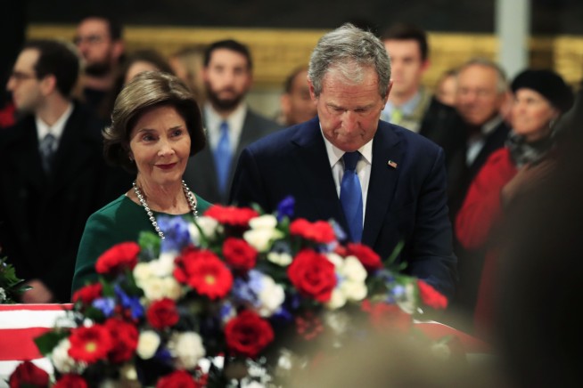 Presidents club assembles for Bush funeral, Trump on fringes