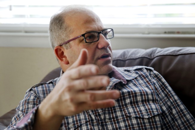 Amid protests, some Syrian refugees find a home in Texas