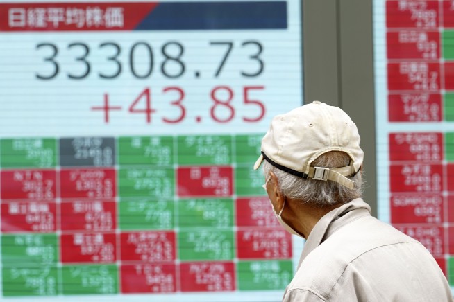 Stock market today: Asian shares sink as central banks crank interest rates still higher