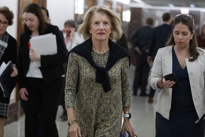 Senate Latest: Majority Leader McConnell holds his Ky. seat