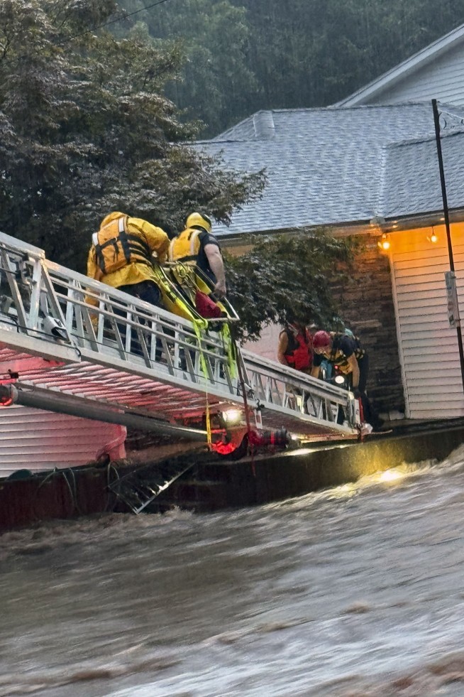 Floods from 'training thunderstorms' lead to dramatic rescues and 2 deaths in Connecticut