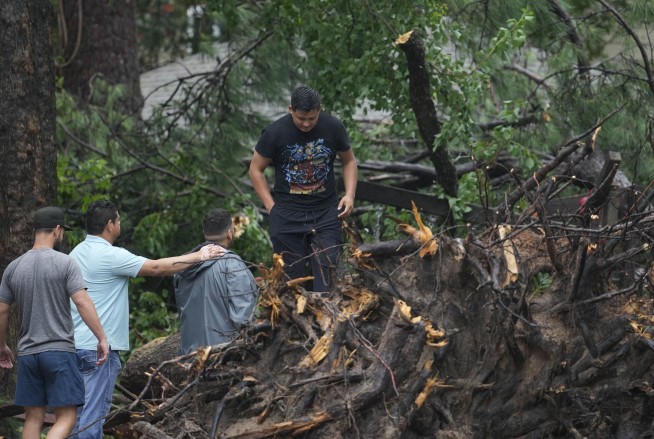 Frustrations mount in the Houston heat after Beryl moves on and leaves millions without power