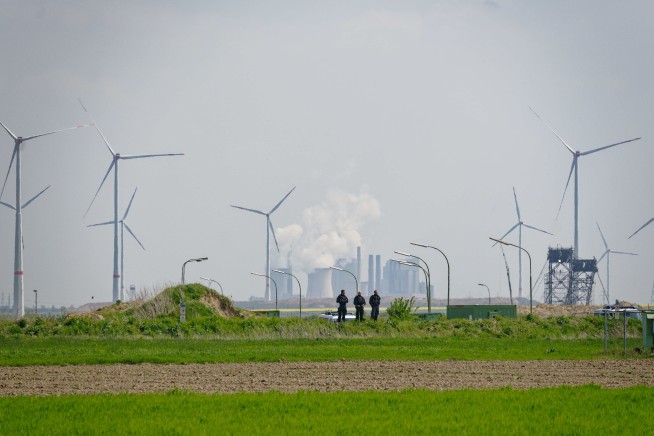 Thousands protest plan to raze German village for coal mine