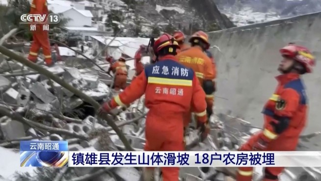 Two survivors rescued after landslide buried homes in freezing weather in southwest China, 11 died