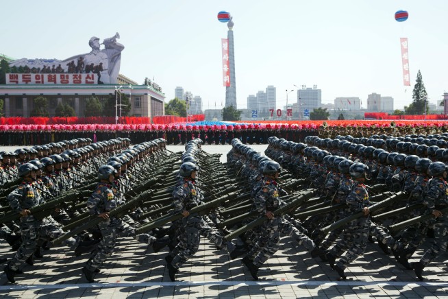 N. Korea stages huge parade, holds back on advanced missiles