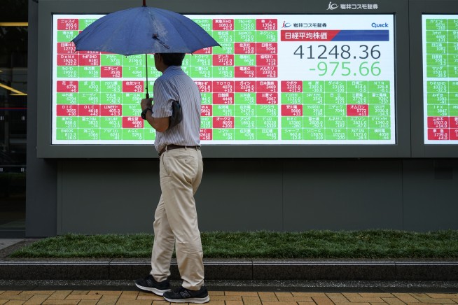 Stock market today: Asian stocks mixed amid volatile yen after Wall St climbs on inflation report
